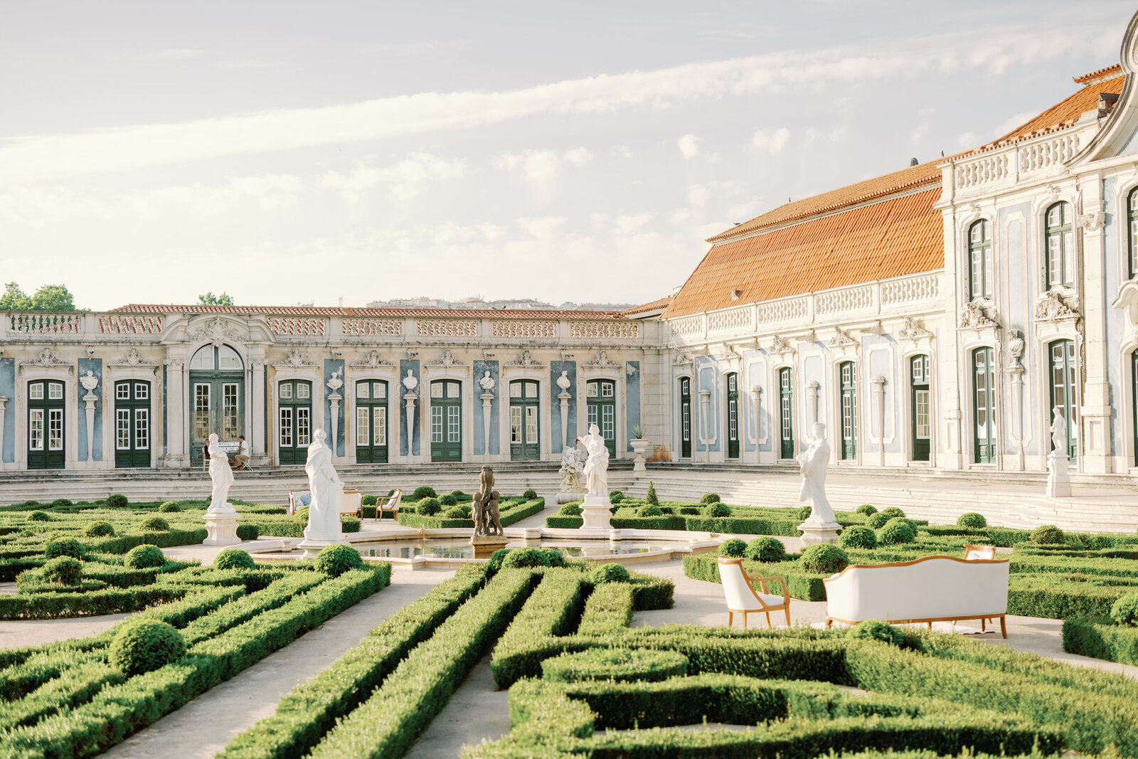 Wide view of the palace and boxwood parterre garden